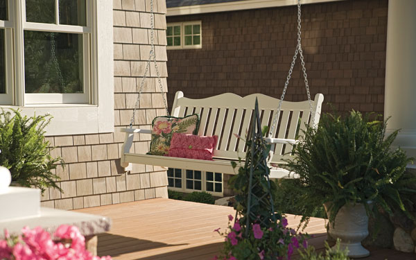 charming porch swing on a covered front porch