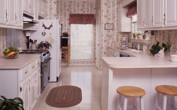 galley style kitchen with plenty of storage space