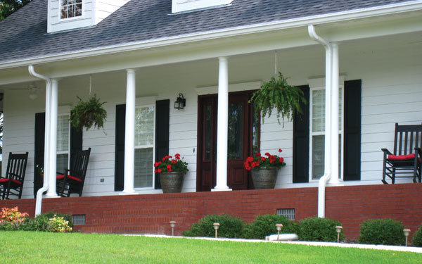 bold colors add contrast to this covered porch