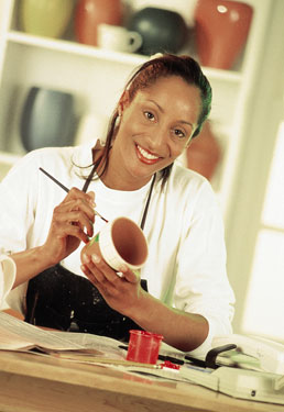 lady painting pottery